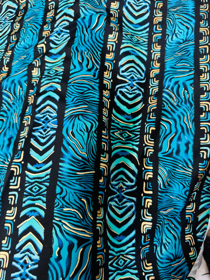 Exotic zebra design on best quality of nylon spandex with gold foil 4-way stretch 58/60” Sold by the YD.