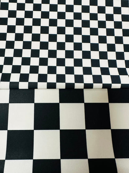 Luxury checkers design 2 sizes print on best quality of nylon spandex 4-way stretch 58/60” Sold by the YD.