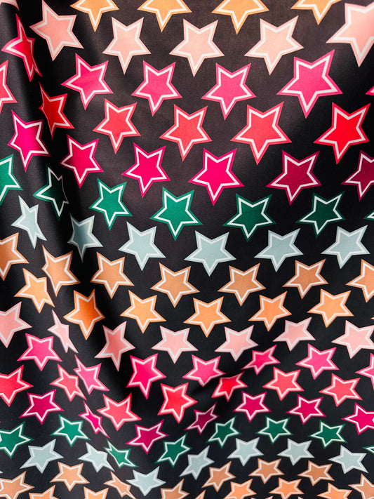 New Stars freedom design black/multicolor print on great quality of nylon spandex 4-way stretch 58/60” Sold by the YD