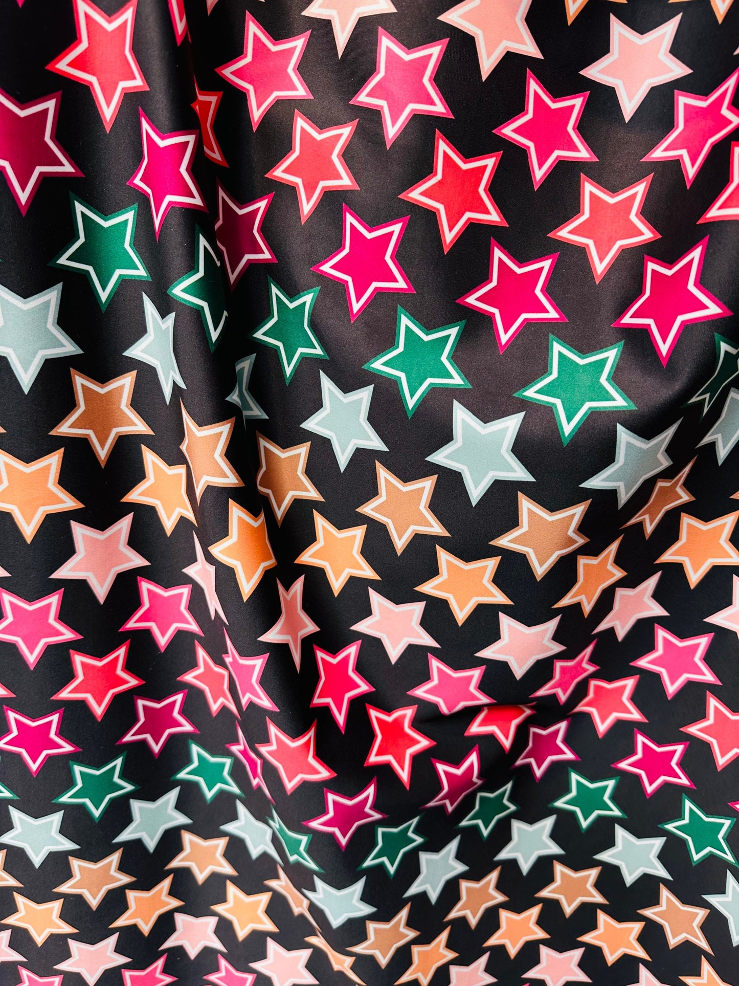 New Stars freedom design black/multicolor print on great quality of nylon spandex 4-way stretch 58/60” Sold by the YD