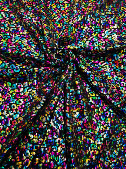 Wild Leopard design Multicolor hologram metallic nylon spandex 4-way stretch 58/60” Sold by the YD