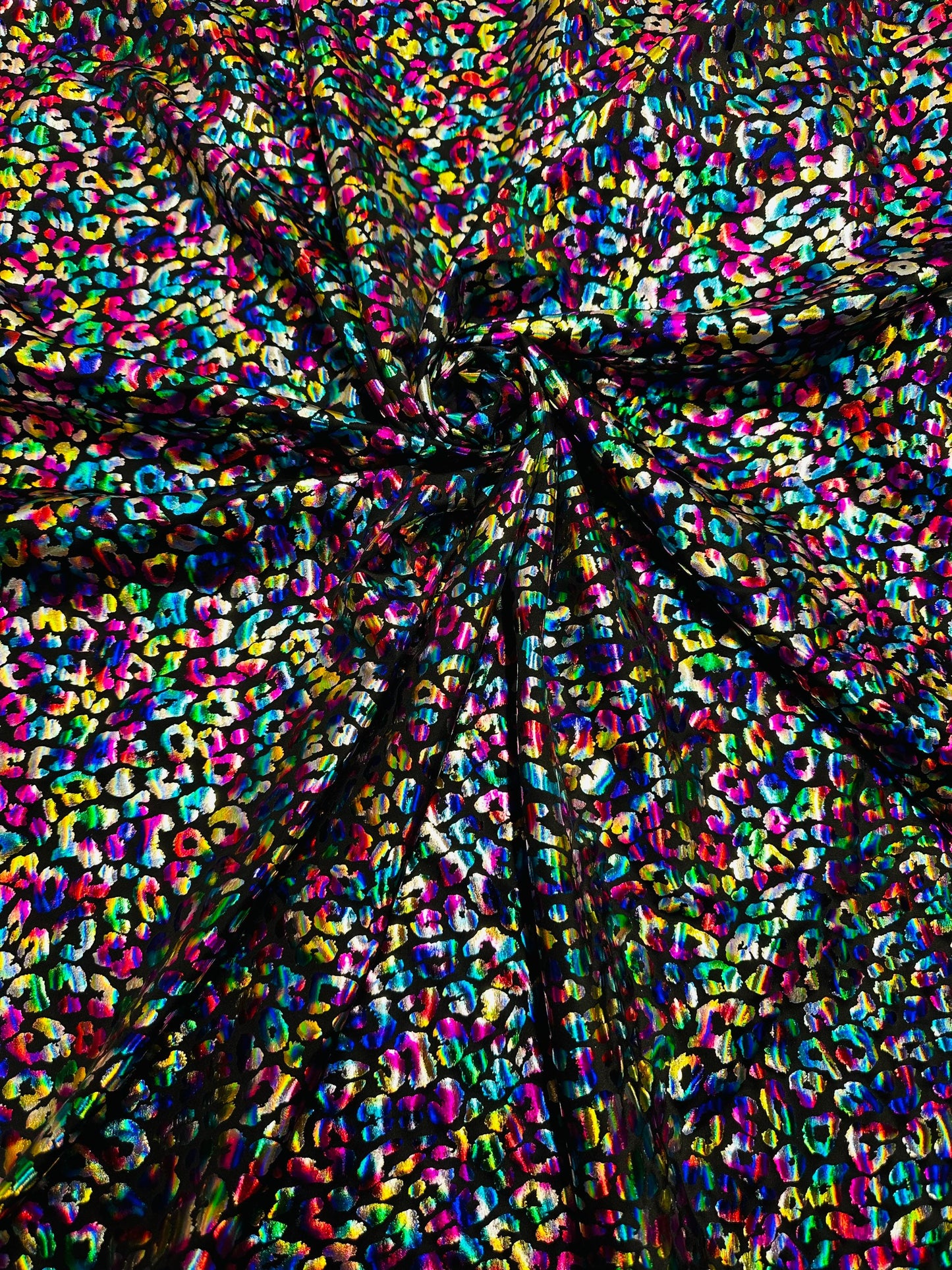 Wild Leopard design Multicolor hologram metallic nylon spandex 4-way stretch 58/60” Sold by the YD