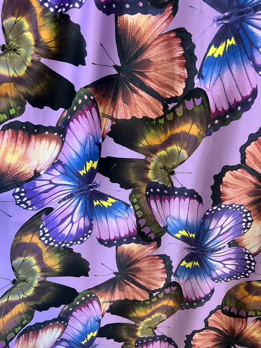 Exotic Butterfly design lavender/Multicolor print on great quality of nylon spandex 4-way stretch 58/60”