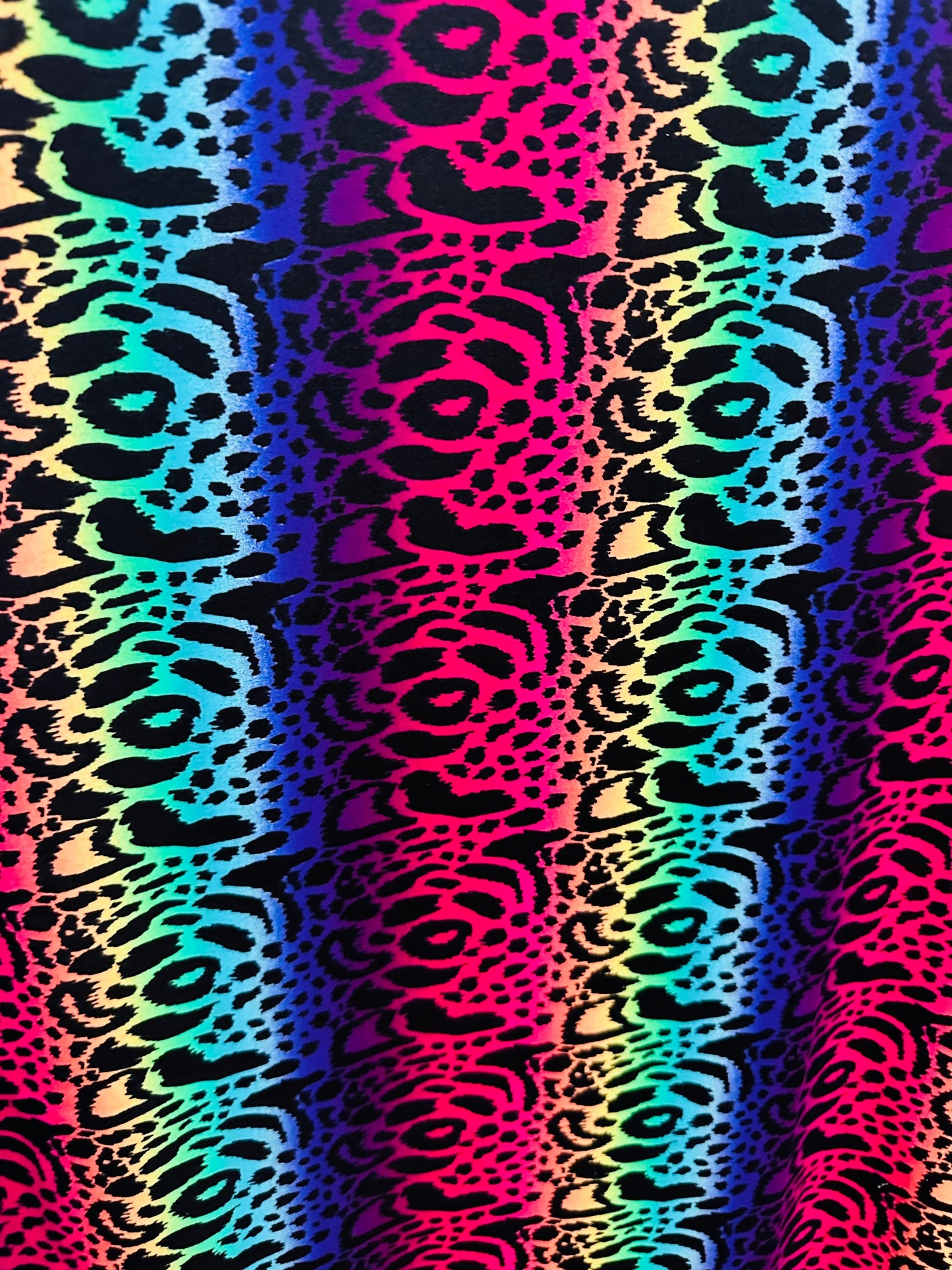 New Exotic Animal design rainbow print on best quality of nylon spandex 4-way stretch 58/60” Sold by the YD. Ships worldwide from LA