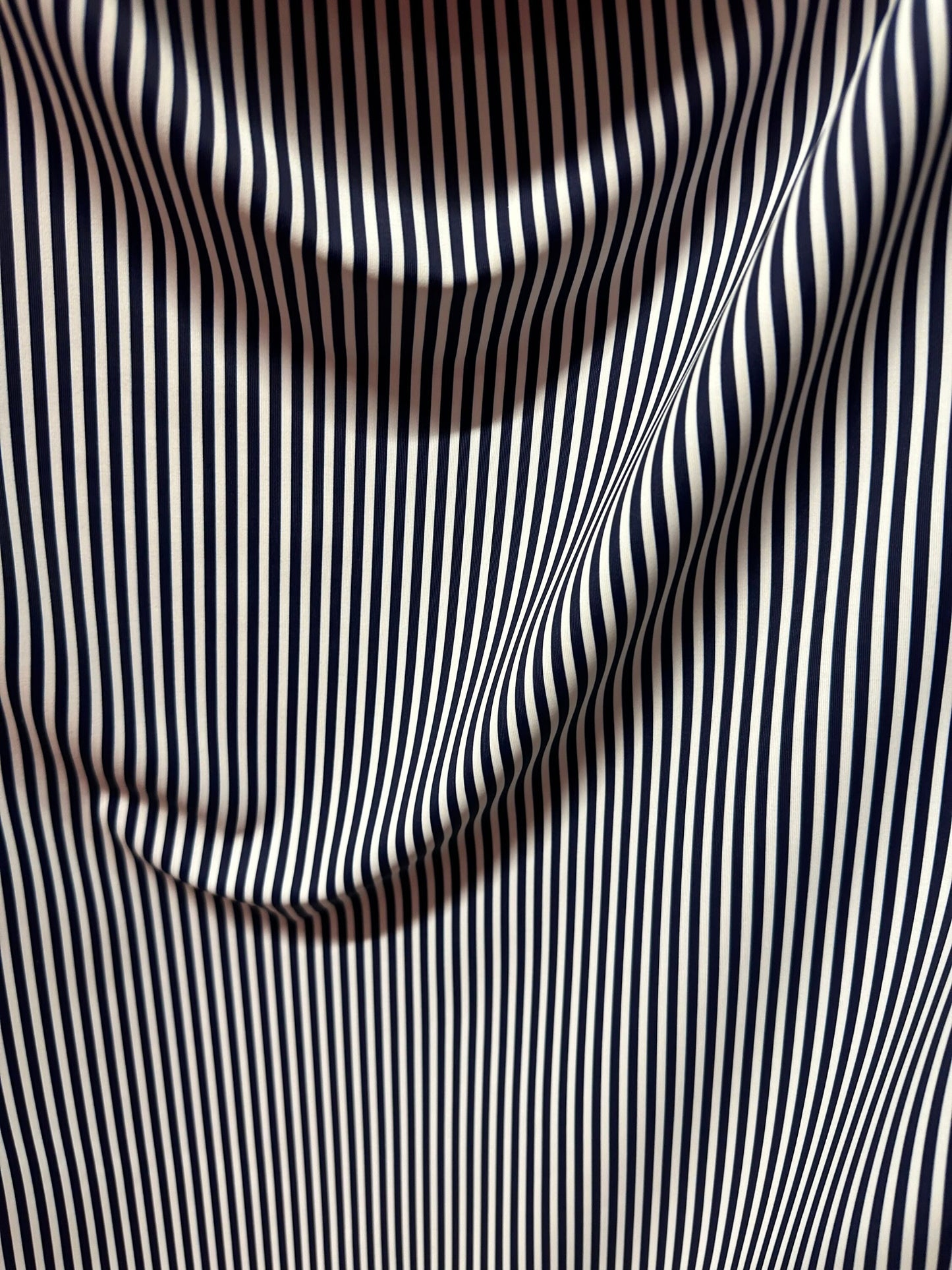 Small striped print nylon spandex best quality white/navy 4-way stretch 58/60” Sold by the YD.