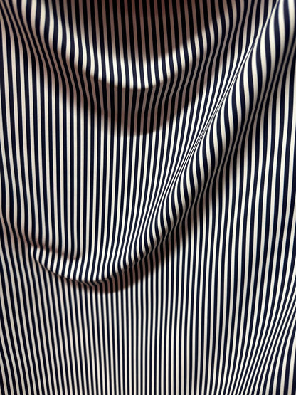 Small striped print nylon spandex best quality white/navy 4-way stretch 58/60” Sold by the YD.