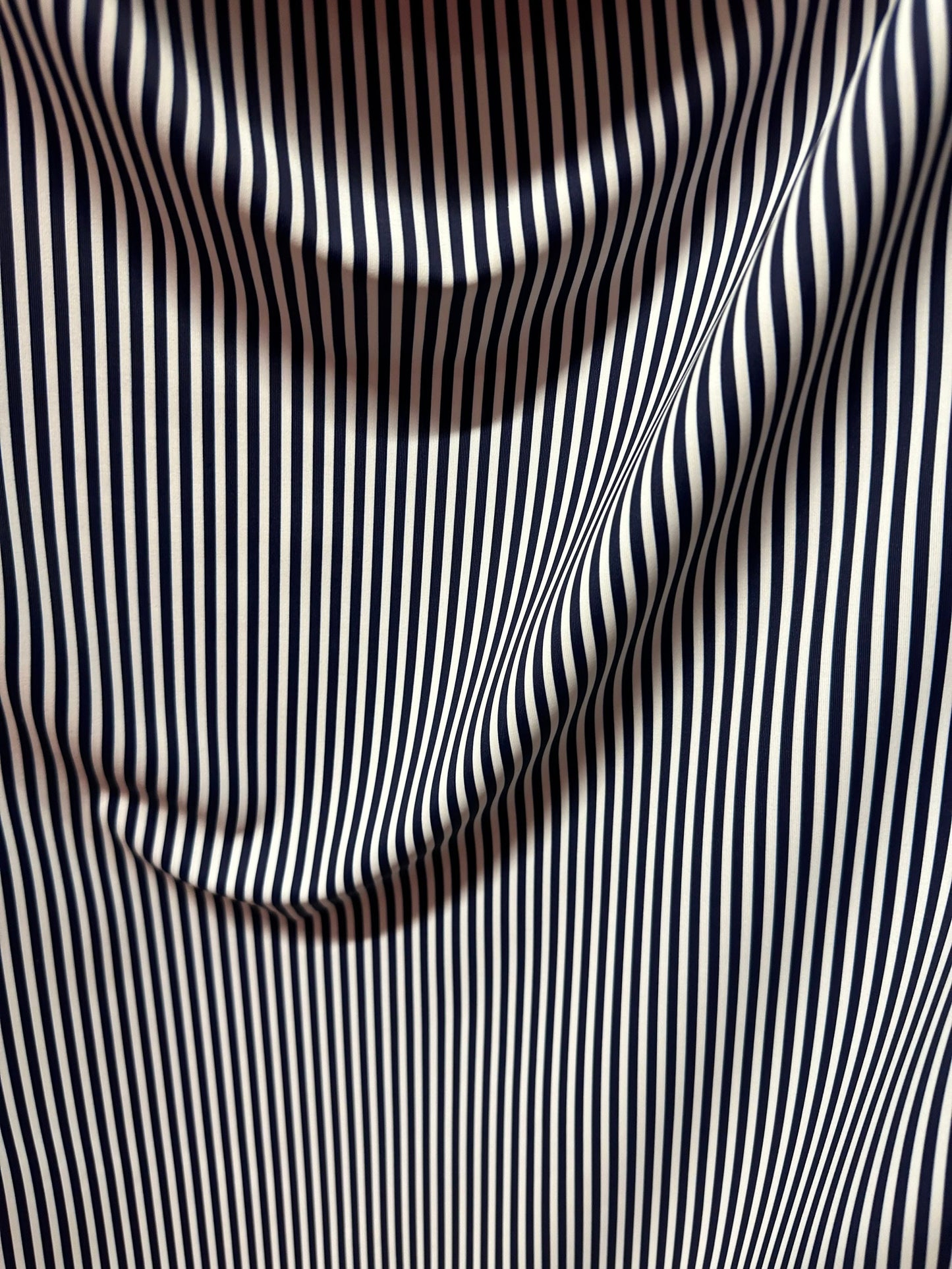 Small striped print nylon spandex best quality white/black 4-way stretch 58/60” Sold by the YD.