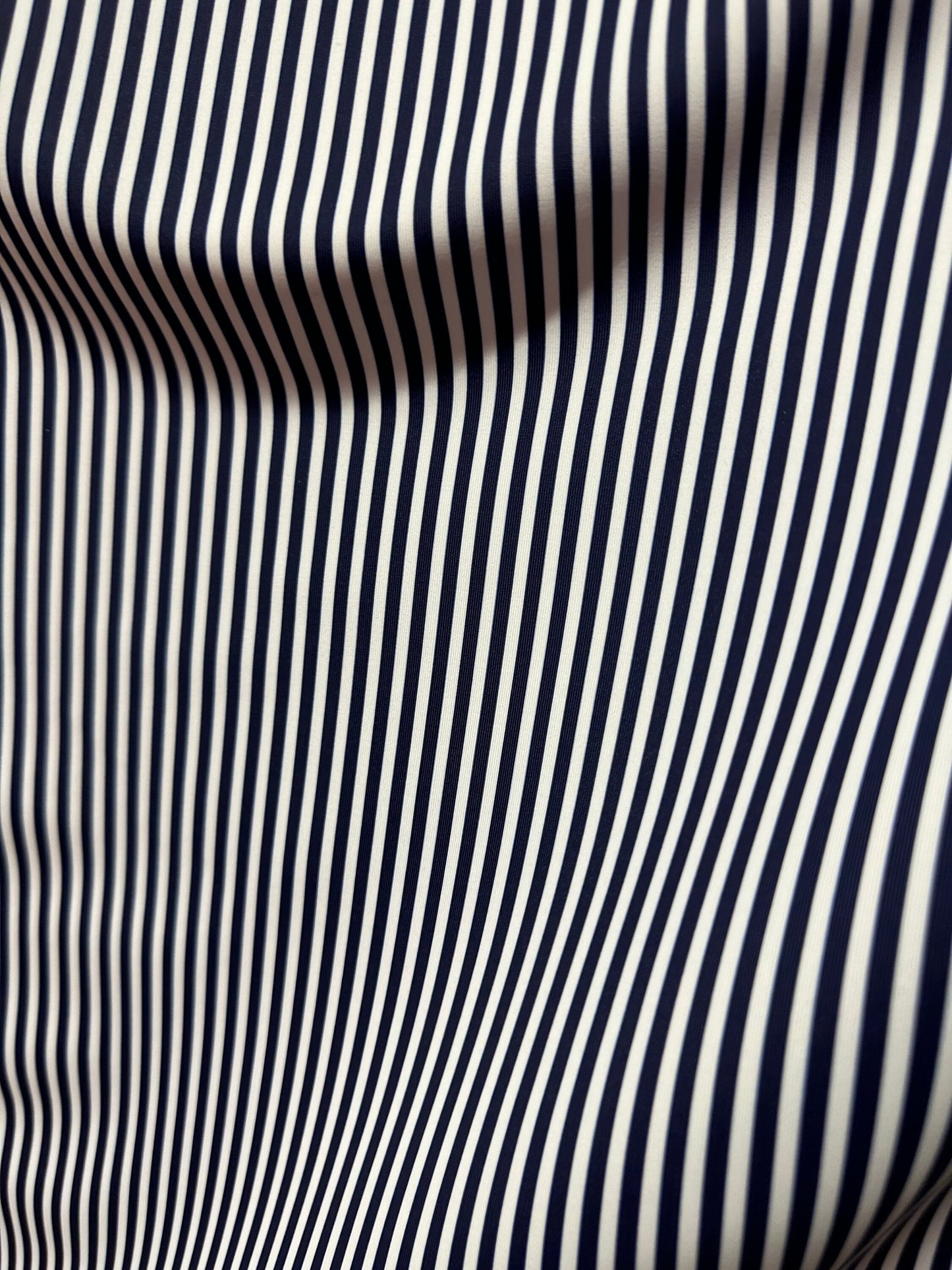 Small striped print nylon spandex best quality white/navy 4-way stretch 58/60” Sold by the YD.