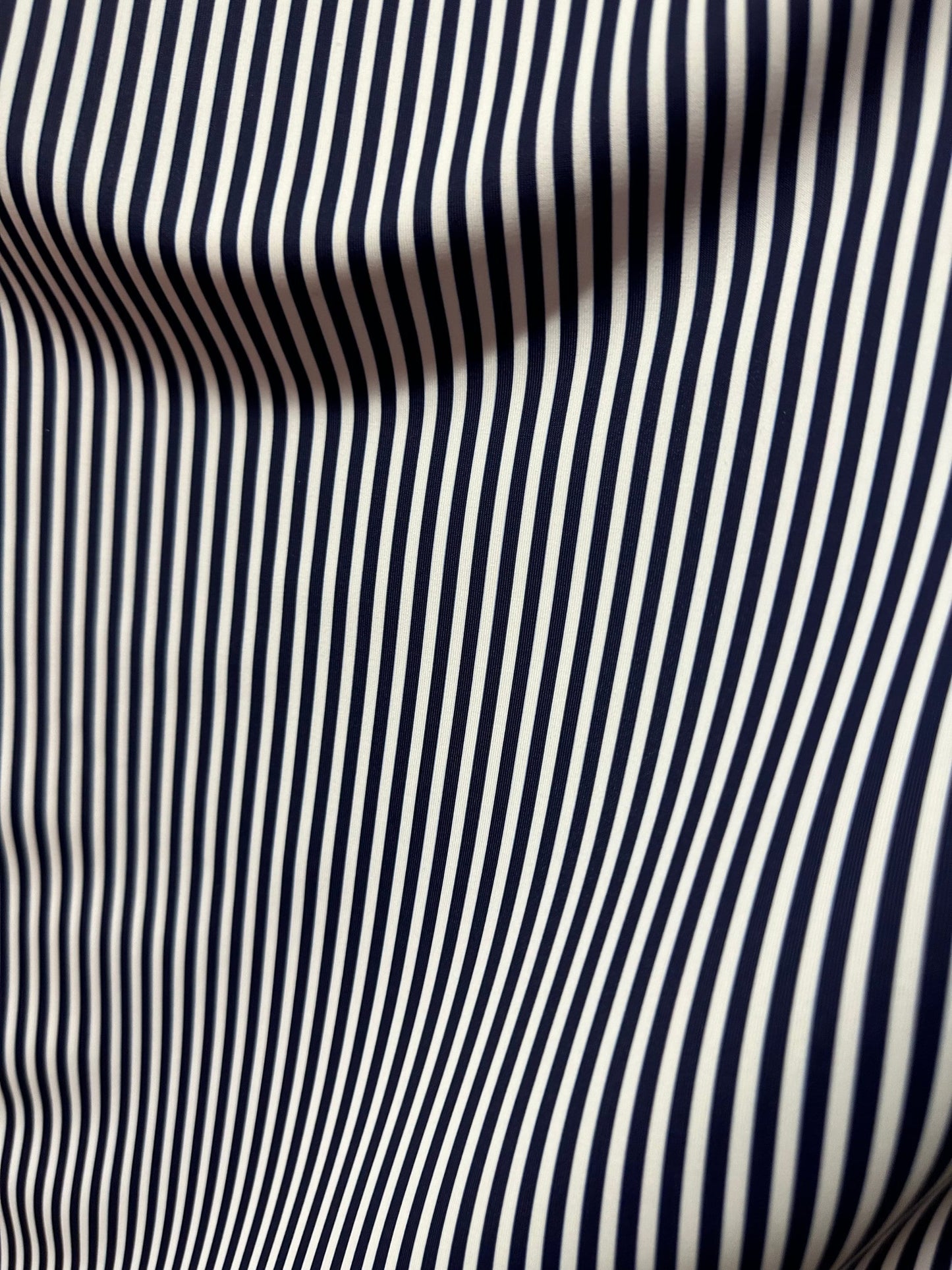 Small striped print nylon spandex best quality white/black 4-way stretch 58/60” Sold by the YD.