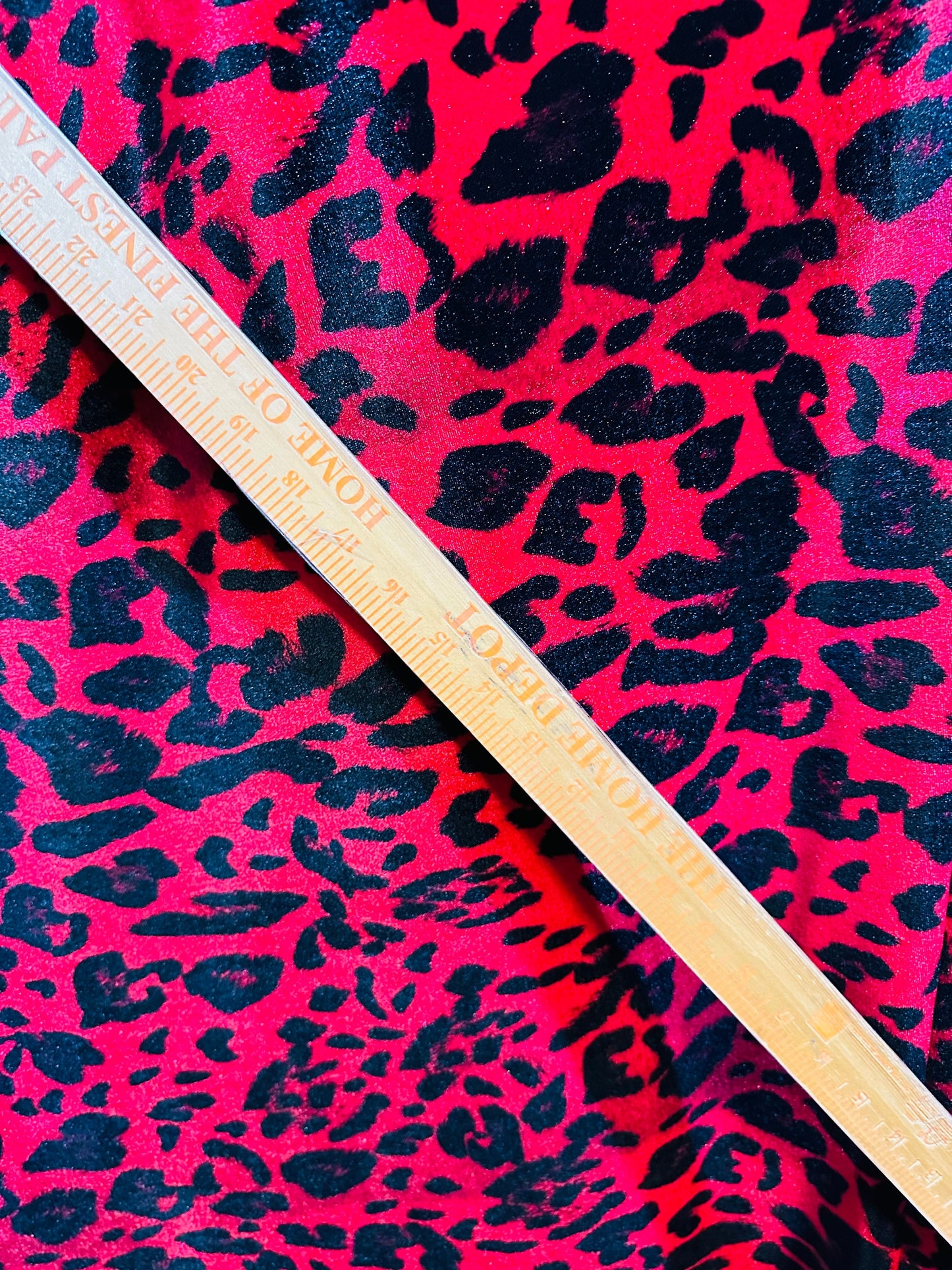 Wild leopard design red/black print on great quality of stretch velvet 4-way stretch 58/60”