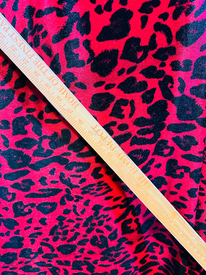 Wild leopard design red/black print on great quality of stretch velvet 4-way stretch 58/60”