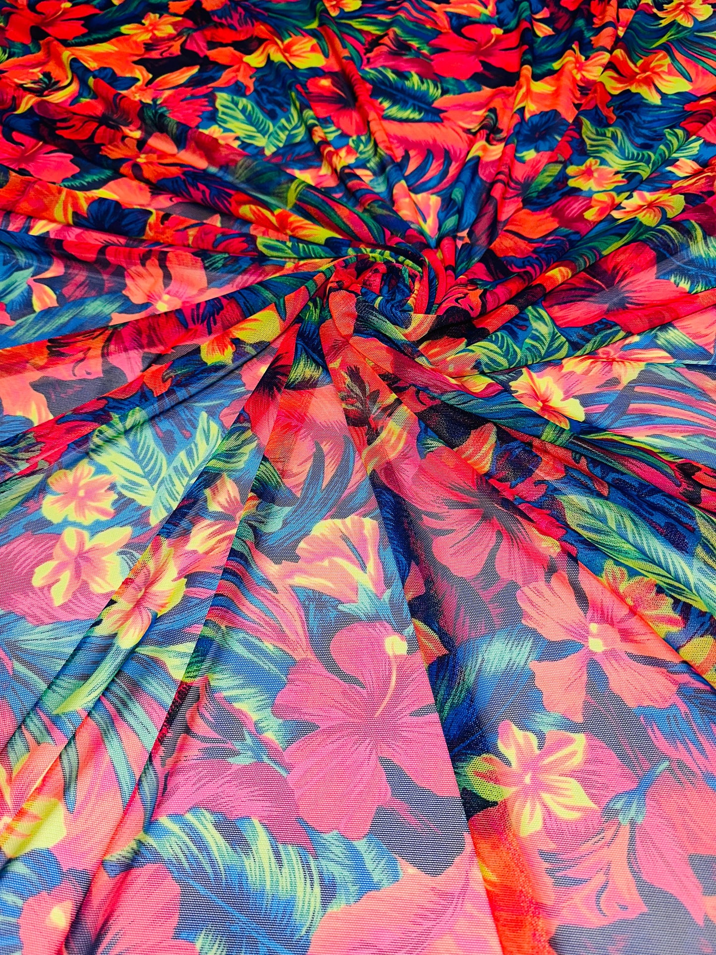 Luxury Hawaiian design with neon colors print on great quality of nylon power mesh 4-way stretch 58/60” Sold by the YD.