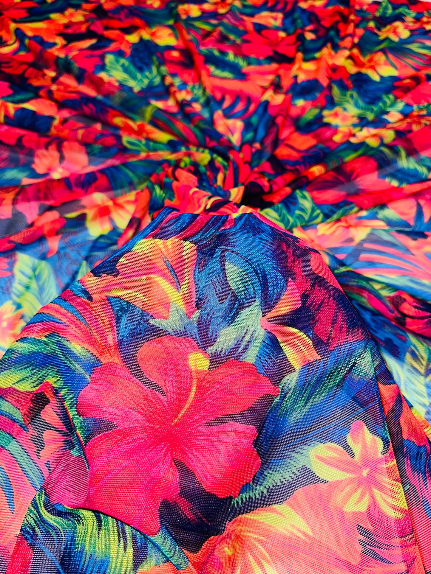 Luxury Hawaiian design with neon colors print on great quality of nylon power mesh 4-way stretch 58/60” Sold by the YD.