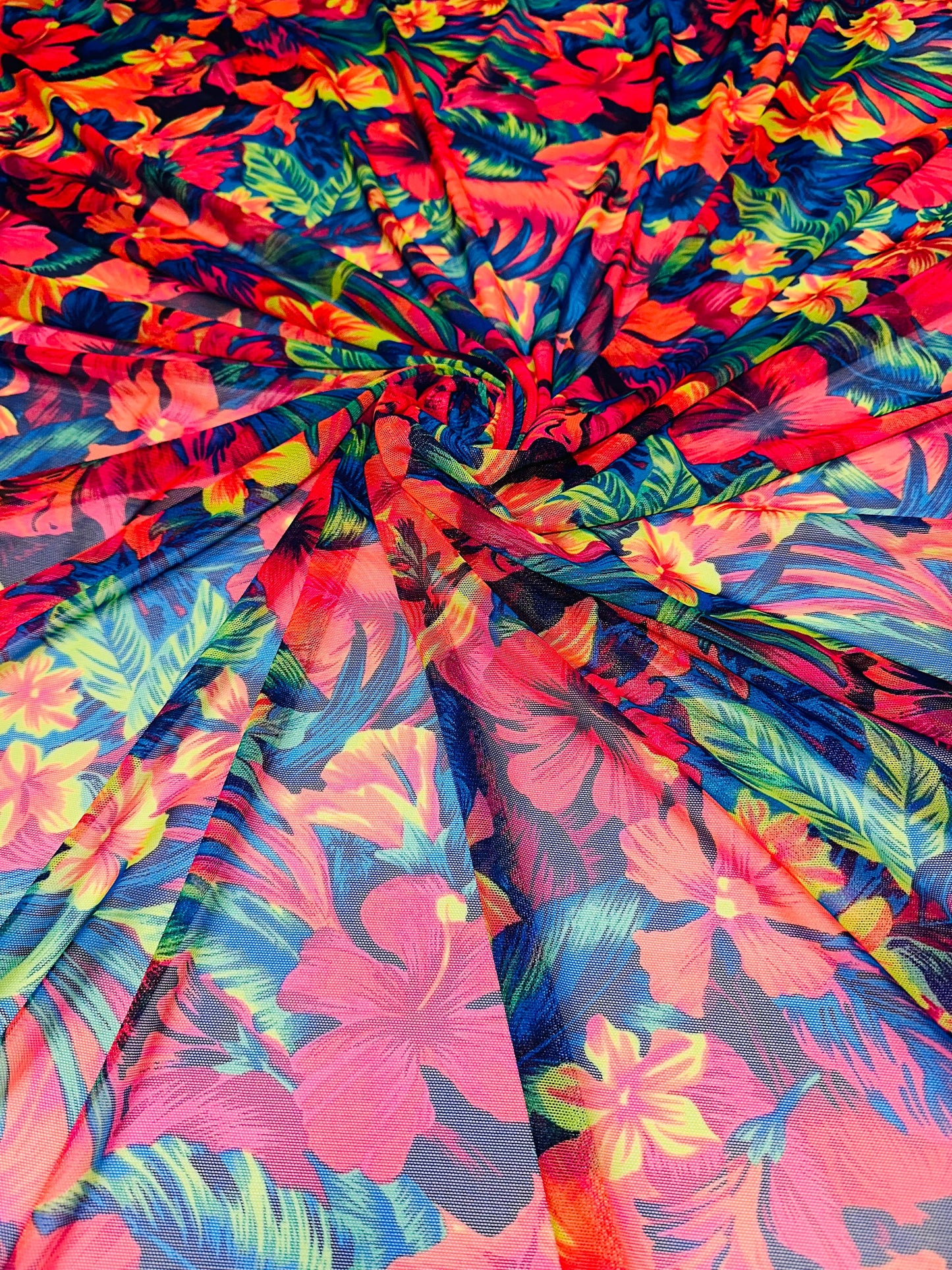 Luxury Hawaiian design with neon colors print on great quality of nylon power mesh 4-way stretch 58/60” Sold by the YD.