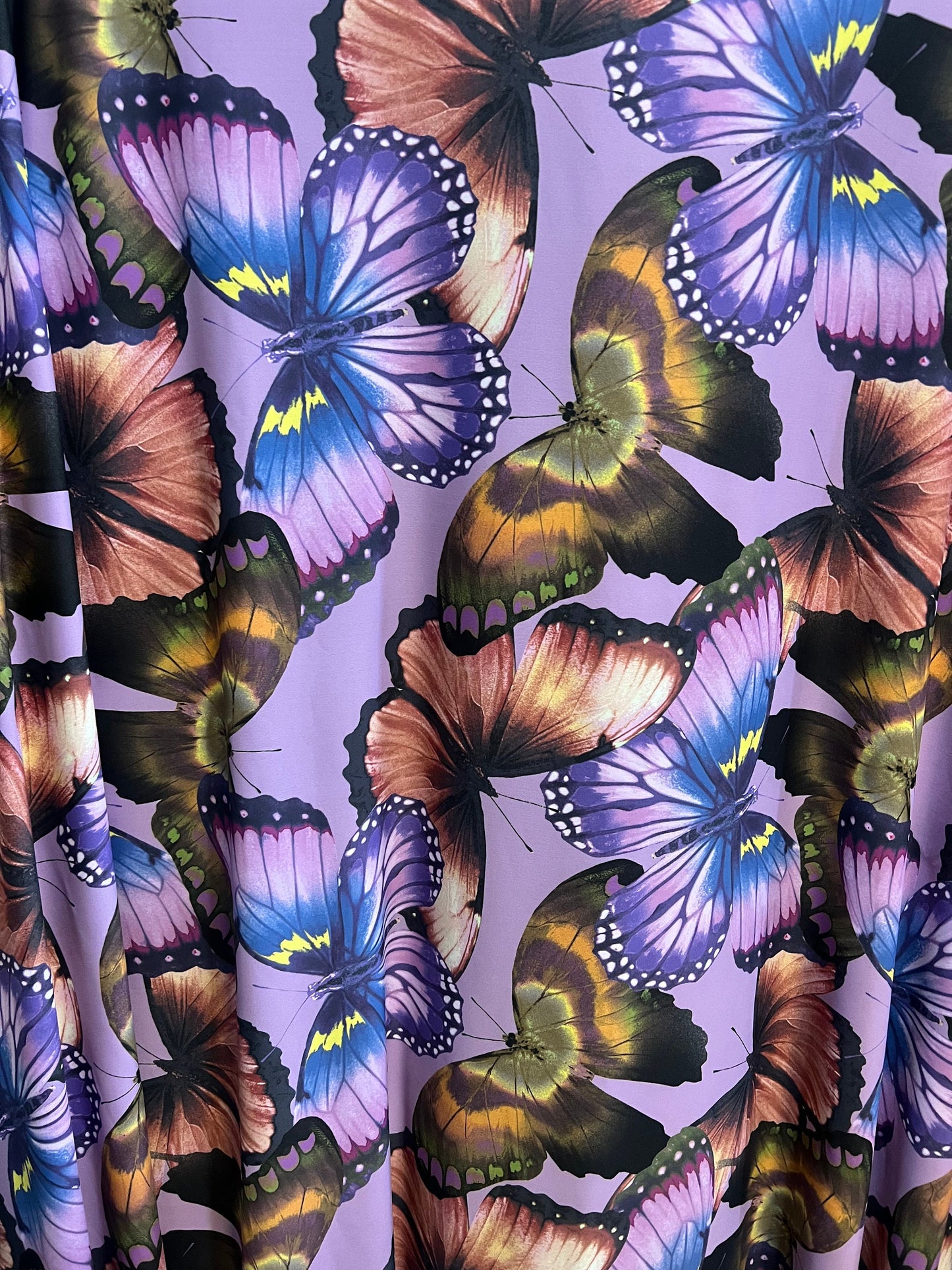 Exotic Butterfly design lavender/Multicolor print on great quality of nylon spandex 4-way stretch 58/60”