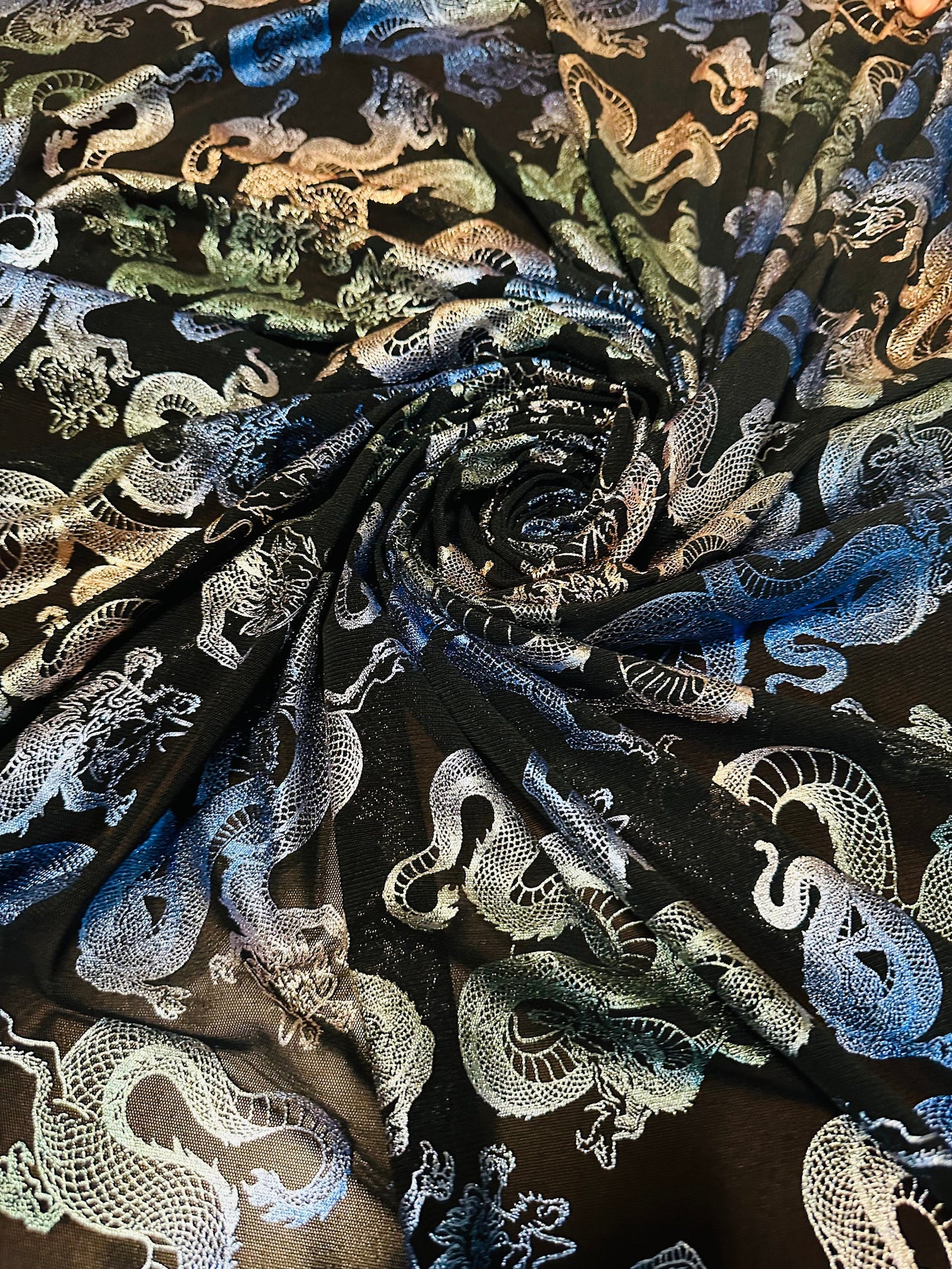 Exotic Dragon design metallic power mesh 4-way stretch 58/60” Sold by the YD. High quality fabrics by AlexLAFabrics