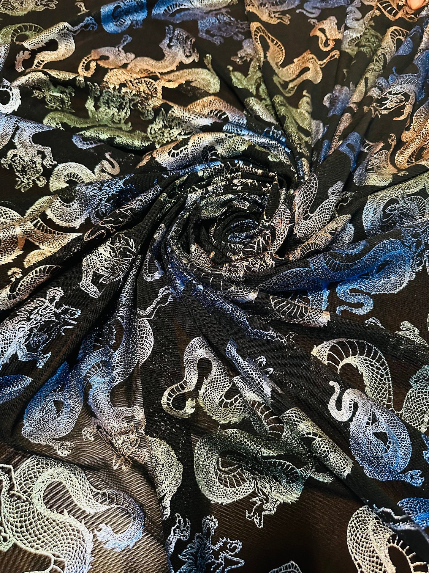 Exotic Dragon design metallic power mesh 4-way stretch 58/60” Sold by the YD. High quality fabrics by AlexLAFabrics