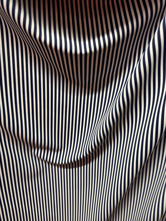 Small striped print nylon spandex best quality white/navy 4-way stretch 58/60” Sold by the YD.