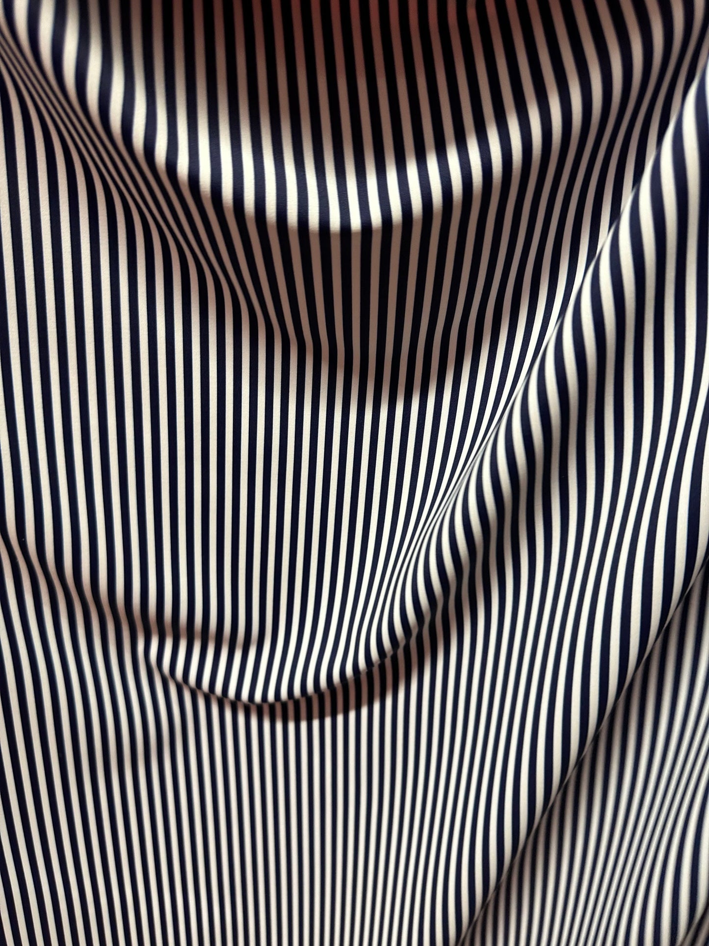 Small striped print nylon spandex best quality white/black 4-way stretch 58/60” Sold by the YD.