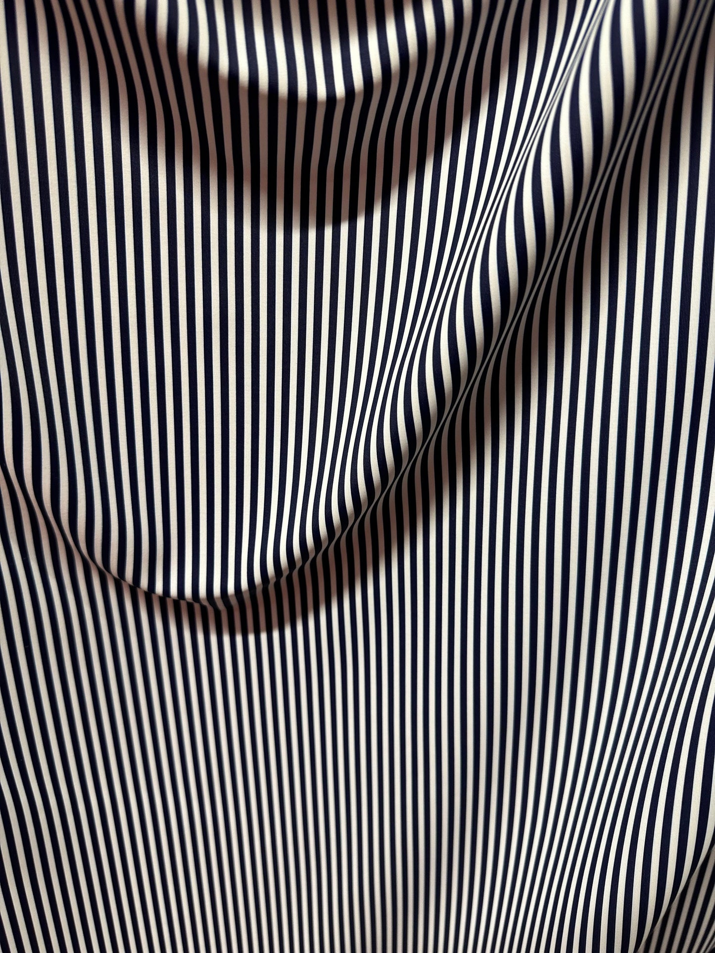 Small striped print nylon spandex best quality white/black 4-way stretch 58/60” Sold by the YD.