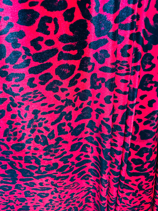 Wild leopard design red/black print on great quality of stretch velvet 4-way stretch 58/60”