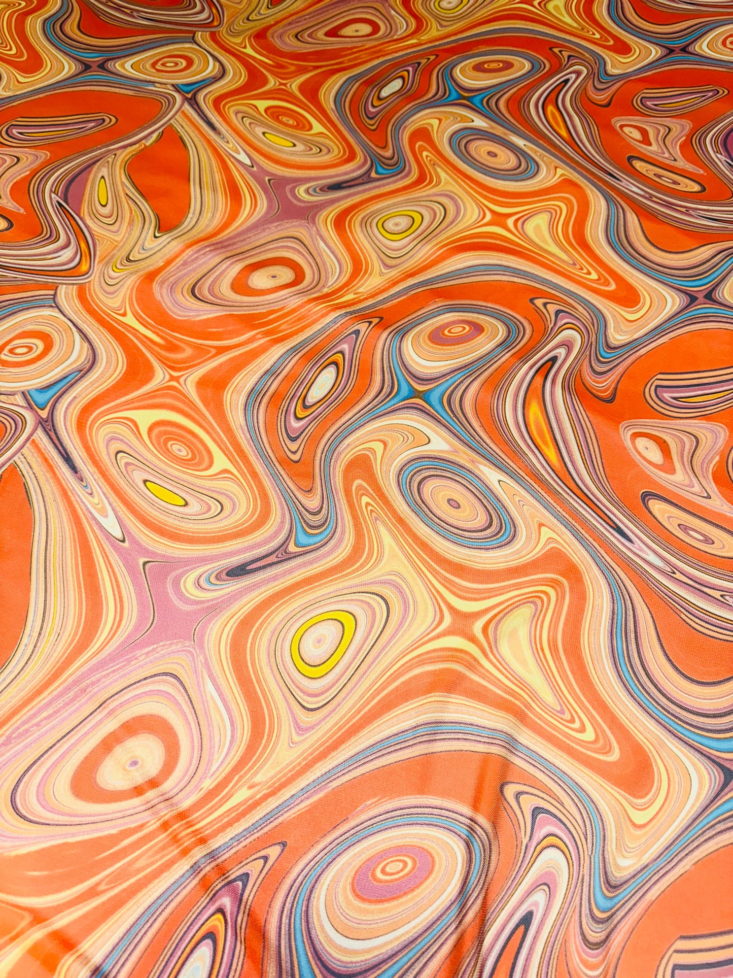 New lava abstract design rust multicolor print on great quality of nylon power mesh 4-way stretch 58/60”