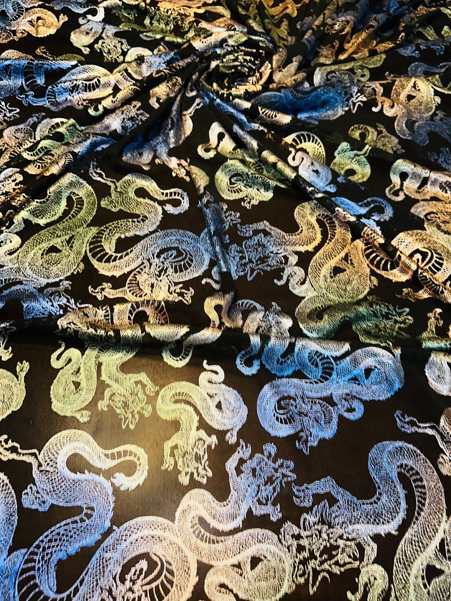 Exotic Dragon design metallic power mesh 4-way stretch 58/60” Sold by the YD. High quality fabrics by AlexLAFabrics