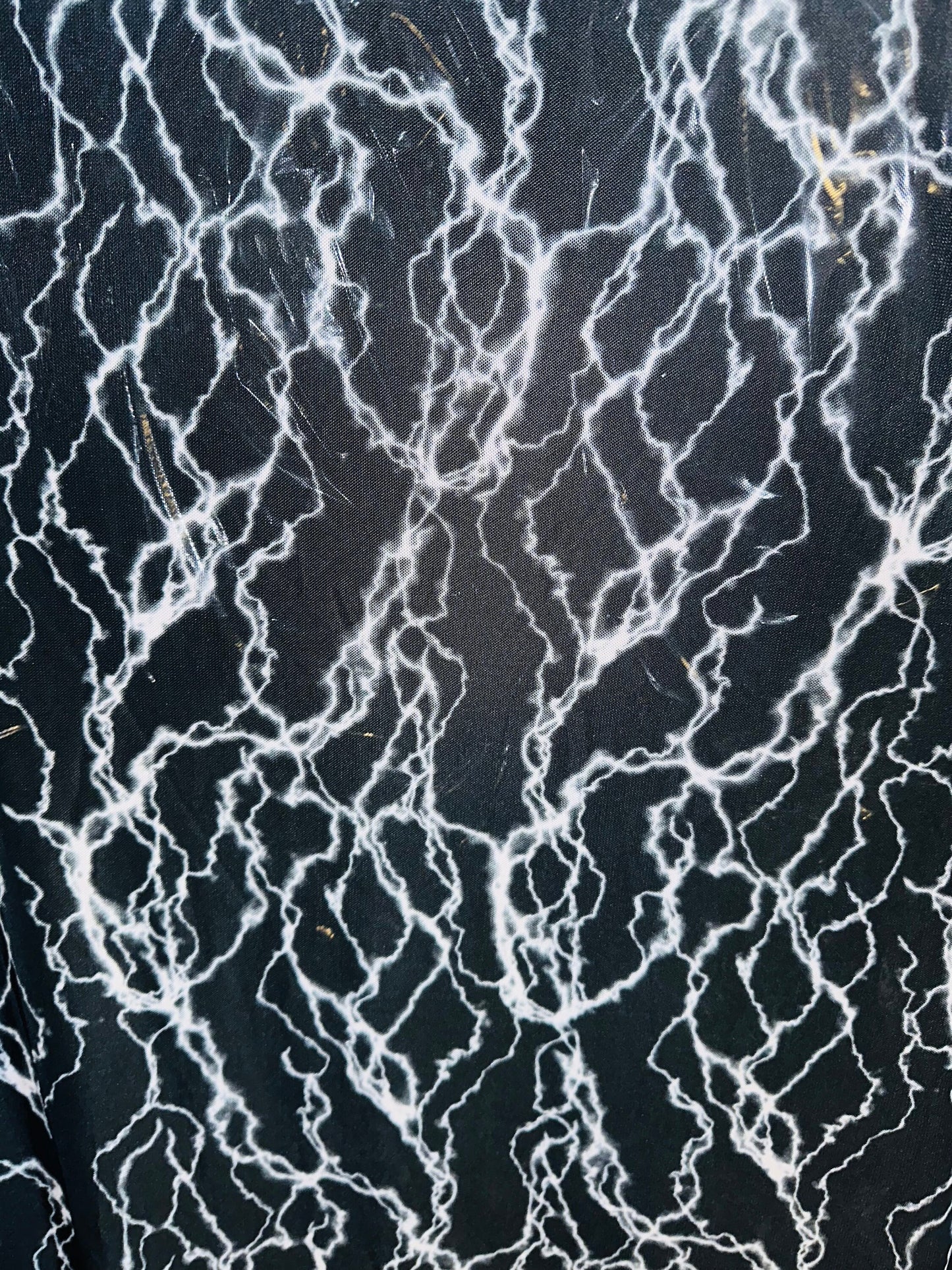 Thunderbolt design print on great quality of power mesh 4-way stretch 58/60”