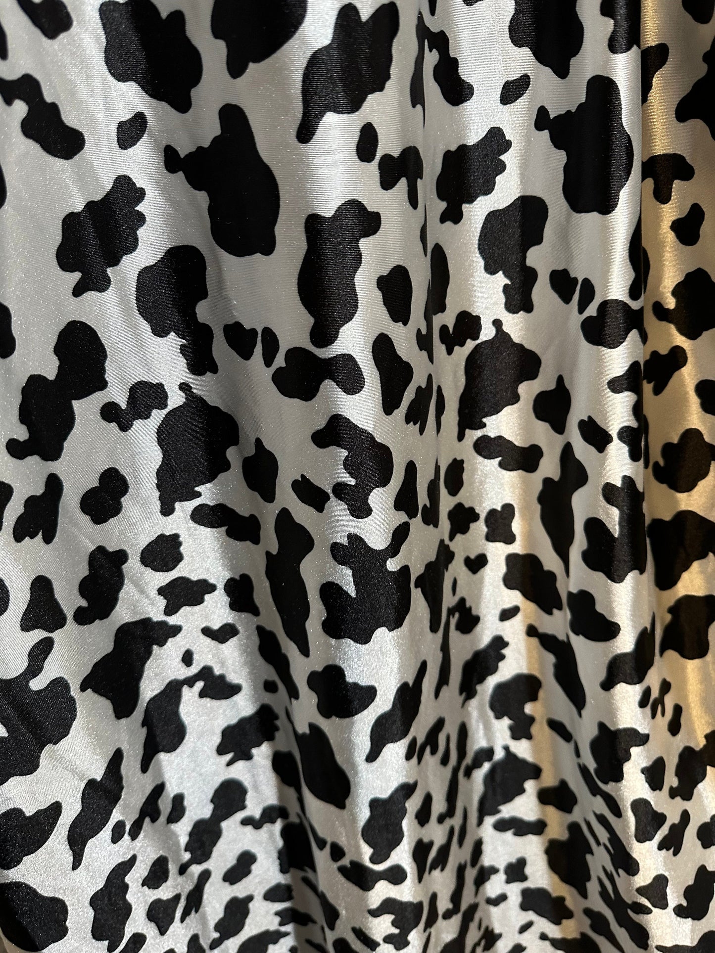 Exotic Cow design print on super shiny satin spandex 4-way stretch 58/60” High quality spandex fabrics by AlexLAFabrics