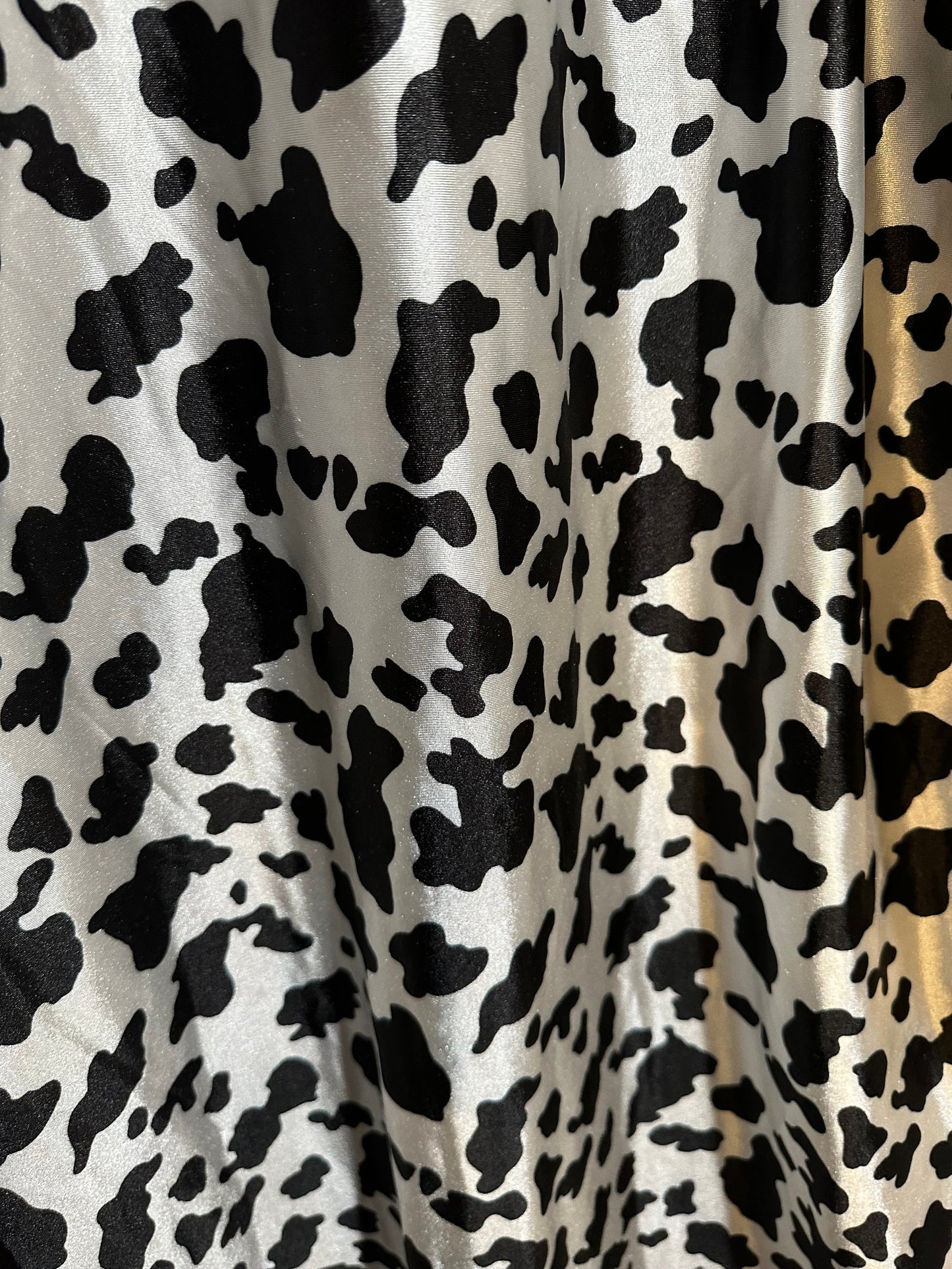 Exotic Cow design print on super shiny satin spandex 4-way stretch 58/60” High quality spandex fabrics by AlexLAFabrics