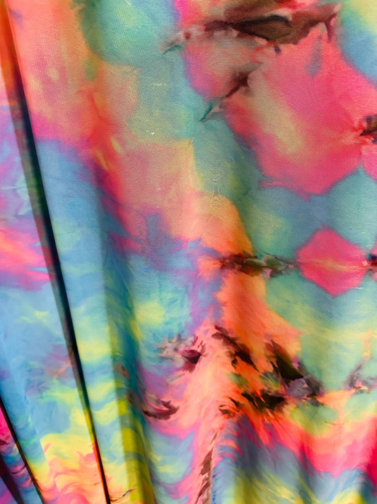 Tie dye multi pastel power mesh 4-way stretch 58/60” Sold by the YD.