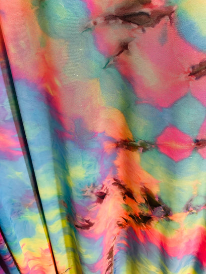 Tie dye multi pastel power mesh 4-way stretch 58/60” Sold by the YD.