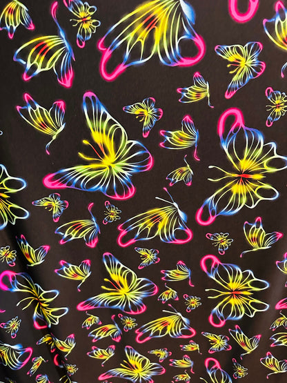 New Rainbow Butterfly design print on great quality of poly spandex 4-way stretch 58/60” Sold by the YD.
