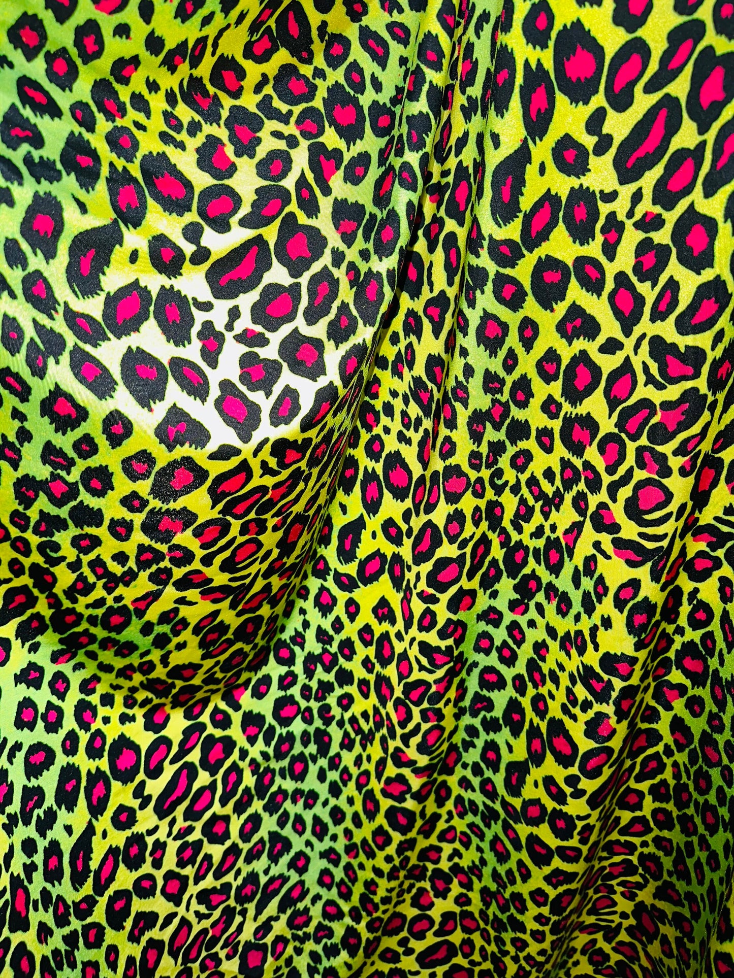 Exotic Leopard design with Neon color print on great quality of nylon spandex 4-way stretch 58/60” Sold by the YD.