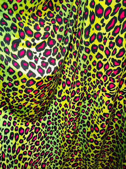 Exotic Leopard design with Neon color print on great quality of nylon spandex 4-way stretch 58/60” Sold by the YD.