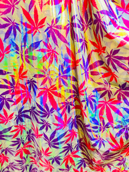New Marijuana leaf design on Iridescent metallic nylon spandex with foggy foil 4-way stretch 58/60”