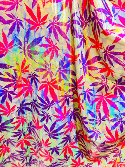 New Marijuana leaf design on Iridescent metallic nylon spandex with foggy foil 4-way stretch 58/60”