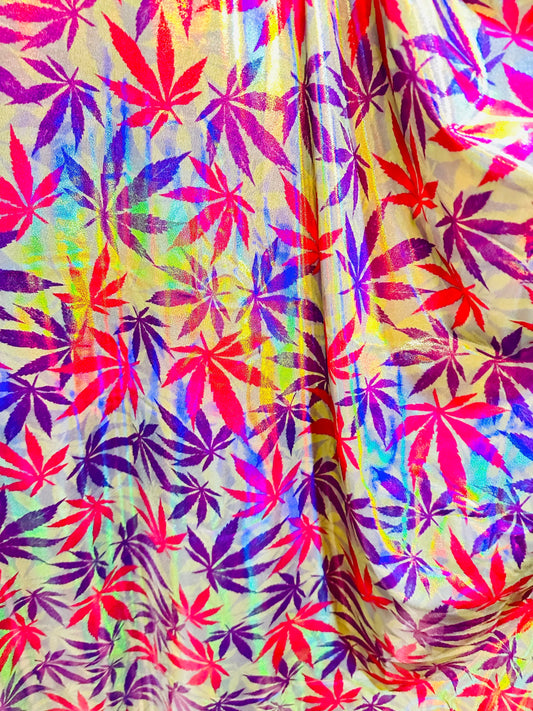 New Marijuana leaf design on Iridescent metallic nylon spandex with foggy foil 4-way stretch 58/60”
