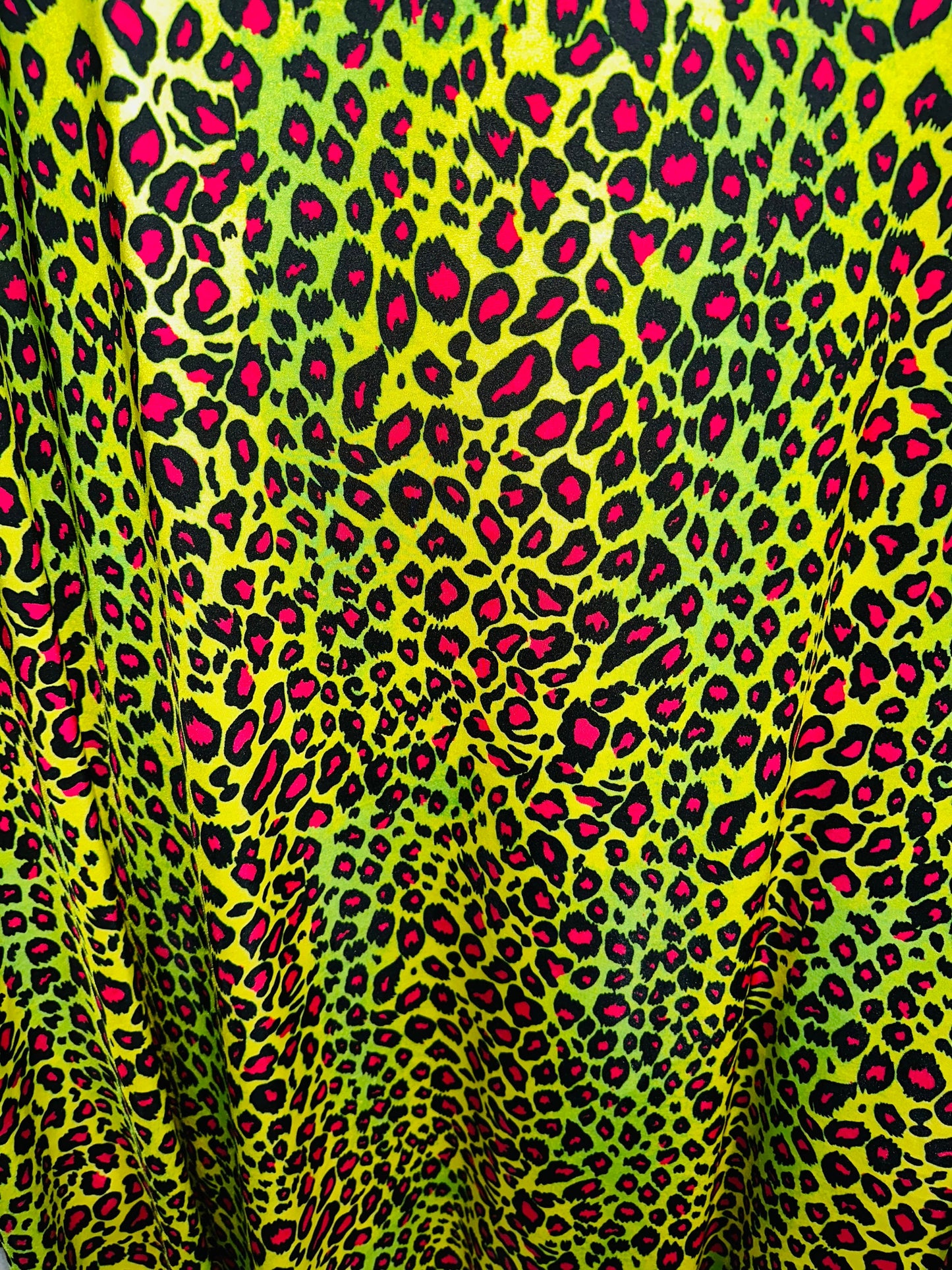 Exotic Leopard design with Neon color print on great quality of nylon spandex 4-way stretch 58/60” Sold by the YD.