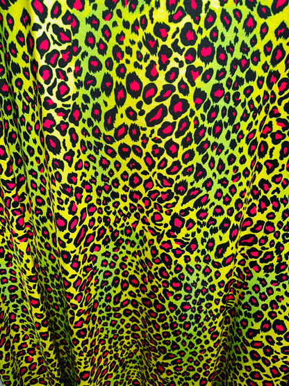 Exotic Leopard design with Neon color print on great quality of nylon spandex 4-way stretch 58/60” Sold by the YD.