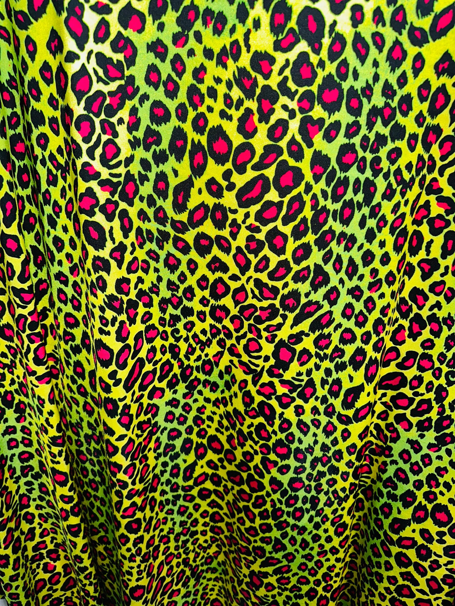 Exotic Leopard design with Neon color print on great quality of nylon spandex 4-way stretch 58/60” Sold by the YD.
