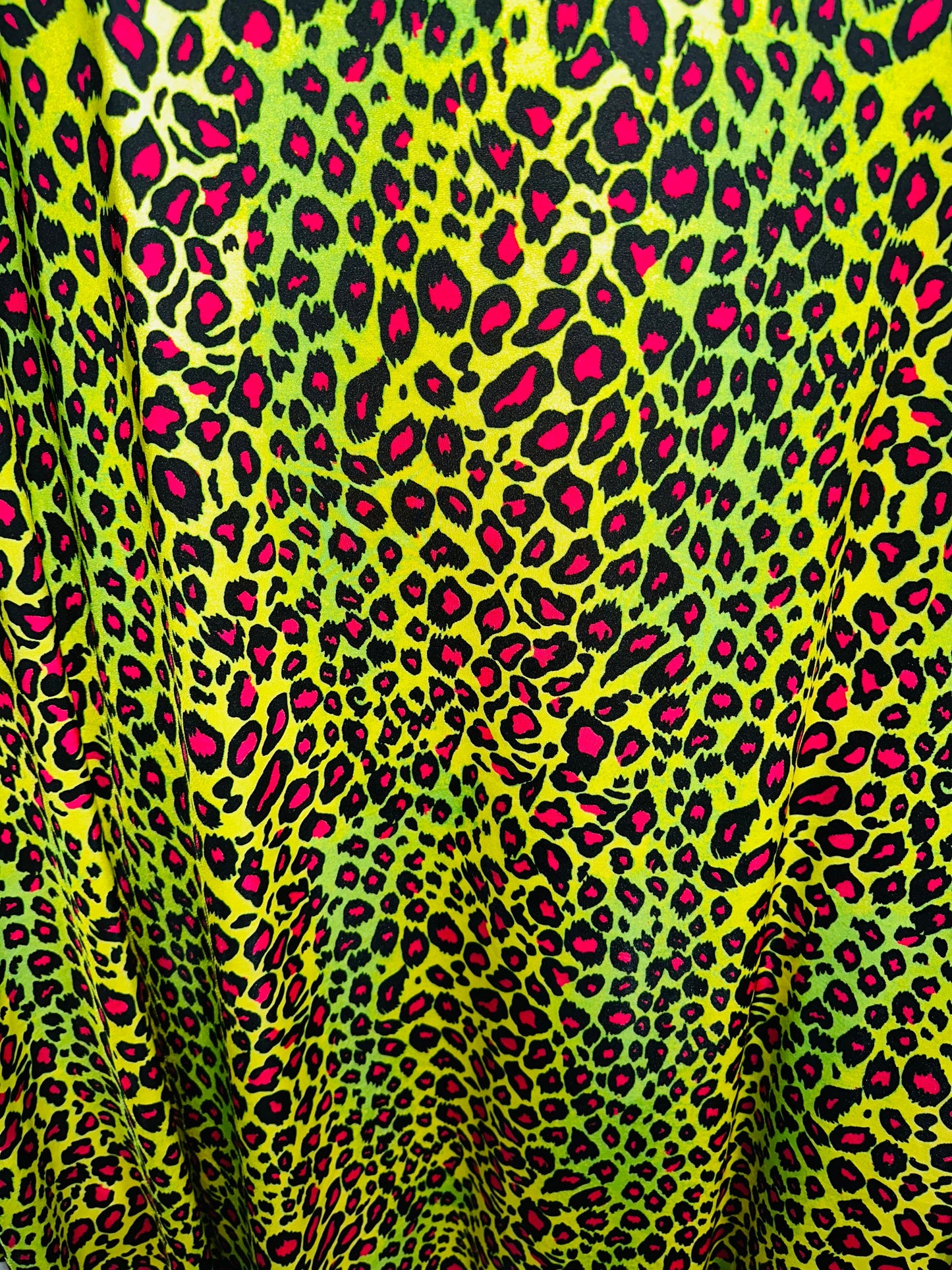 Exotic Leopard design with Neon color print on great quality of nylon spandex 4-way stretch 58/60” Sold by the YD.