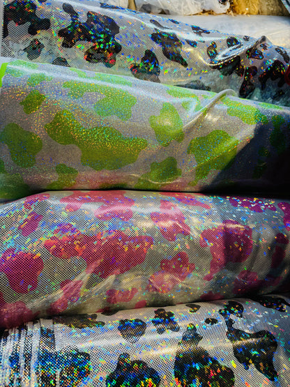 Cow Exotic design on metallic hologram nylon spandex 4-way stretch 58/60”