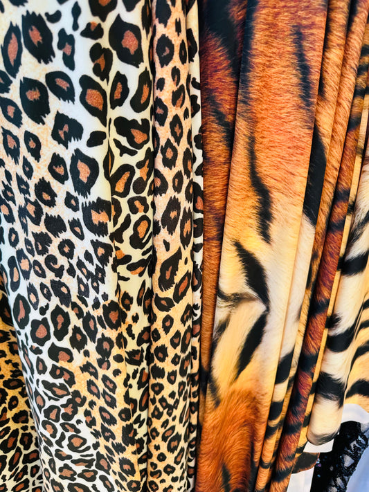 New Exotic Leopard and Tiger design print on great quality of stretch velvet 4-way stretch 58/60” Sold by the YD.