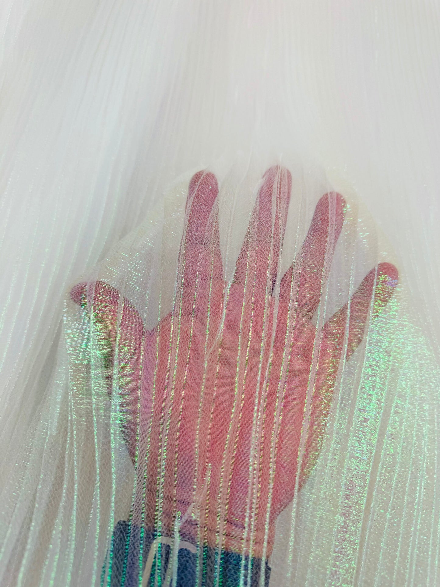 New Unicorn pleated iridescent organza 50/52” Sold by the YD.