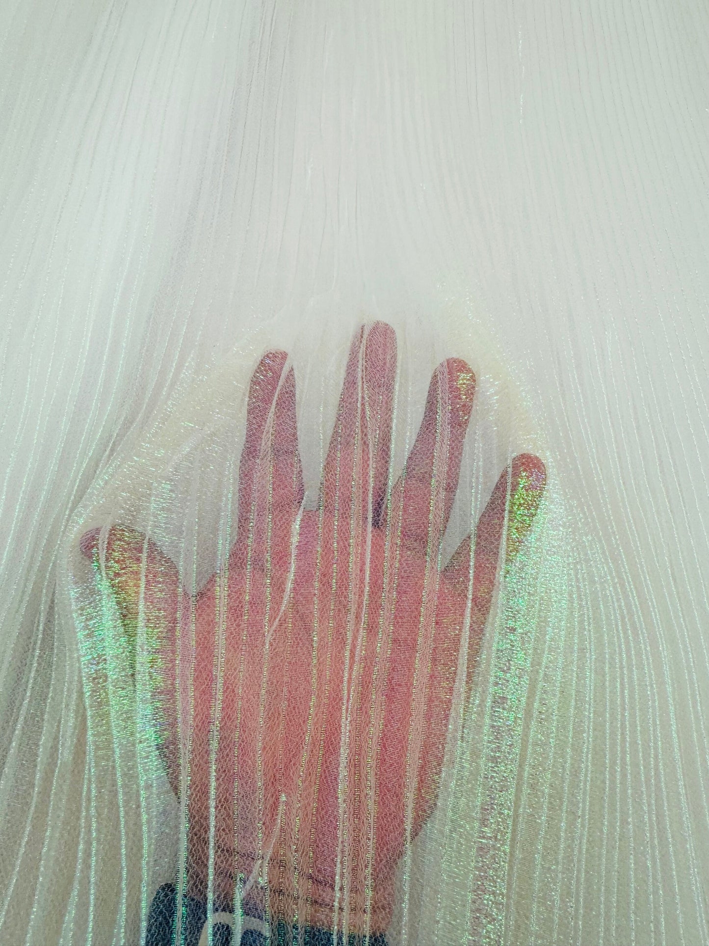 New Unicorn pleated iridescent organza 50/52” Sold by the YD.