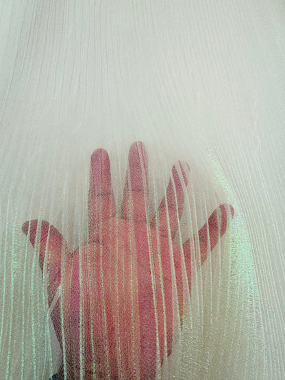 New Unicorn pleated iridescent organza 50/52” Sold by the YD.