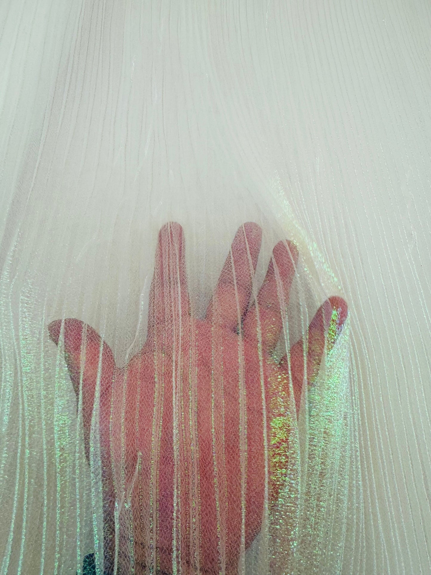 New Unicorn pleated iridescent organza 50/52” Sold by the YD.