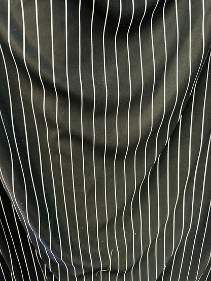 Pin stripes on nylon spandex 4-way stretch 58/60” Sold by the YD. Ships worldwide from Los Angeles California USA.