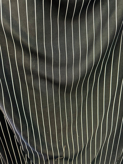 Pin stripes on nylon spandex 4-way stretch 58/60” Sold by the YD. Ships worldwide from Los Angeles California USA.
